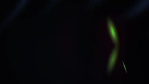 Glowing green light in dark background with blue streaks. Stock Footage 337508903