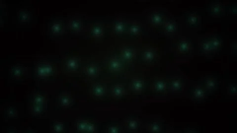 Glowing green lights on black background. Vidéo 335357518