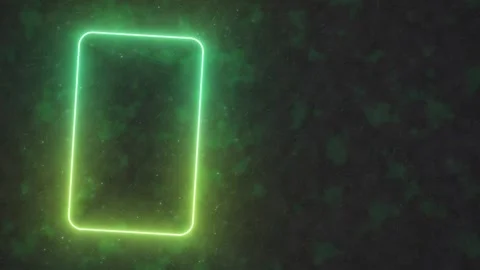 Glowing green neon rectangle pulses gently against a dark, mossy forest floor Stock Footage 345187601