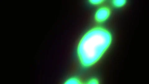 Glowing Green Objects in Dark Background. Stock Footage 334338464