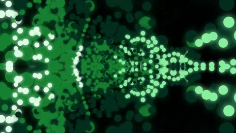Glowing green orbs float on black, creating a bokeh effect 스톡 동영상 331643322