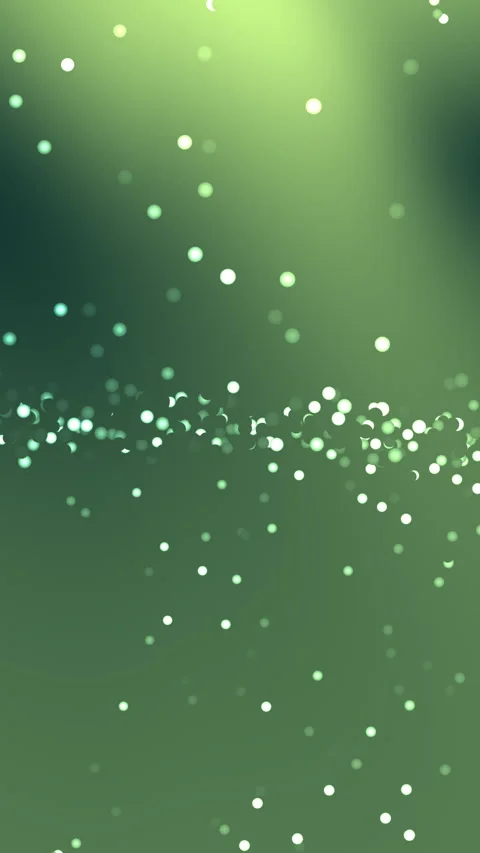 Glowing Green Particles Floating in Soft Abstract Bokeh Background Stockbeeldmateriaal 333984459