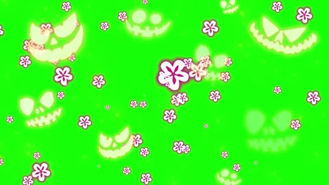 Glowing green pumpkin faces and falling pink blossoms motion background for Stock Footage 345330187