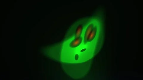 Glowing green remote control closeup. Stock Footage 334188126
