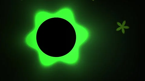 Glowing green shape with black center and asterisk. Stock Footage 335957466