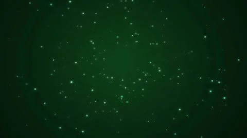 Glowing green sparkling dust particles floating and drifting against a dark.. Stock Footage 343507508
