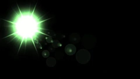 Glowing green star and light rays on plain black background Video stock 344835199