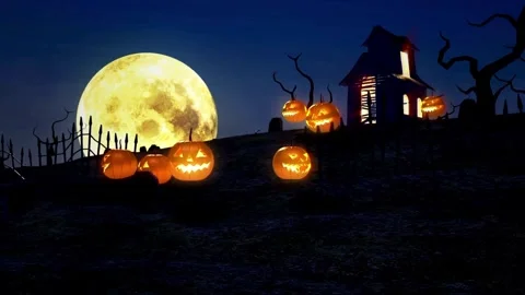 Glowing Halloween pumpkins in a spooky graveyard at full moon Stock Footage 334104825