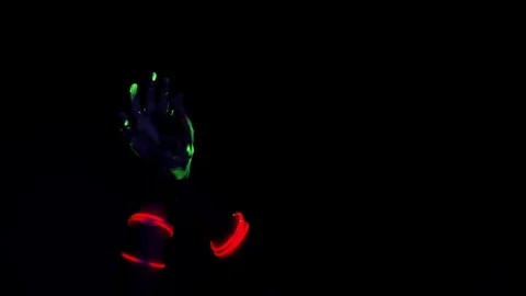 Glowing hand dancing movement in black background. Stock Footage 96181690