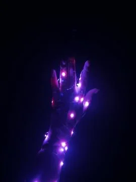 A glowing hand in the dark -1 Stock Photos