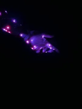 A glowing hand in the dark -5 Stock Photos