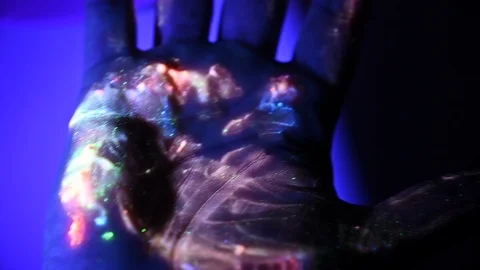 Glowing hand with ultraviolet light Stock Footage 103986146