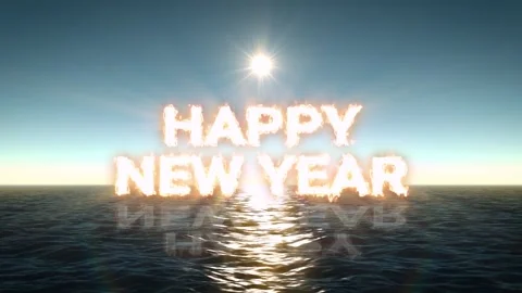 Glowing Happy New Year Text on the Sunset Ocean Stock Footage 265247375