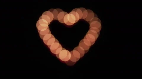 Glowing heart defocus Video stock 55971047