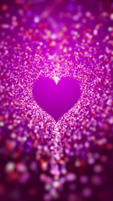 Glowing heart on pink loop background. Glitter heart shape with shine particles. Video stock 278473539