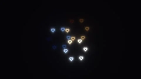 Glowing heart shapes appear on a dark background in a Stock Footage 338034200