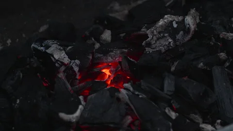Glowing hot ember between charcoal. Video stock 276227834