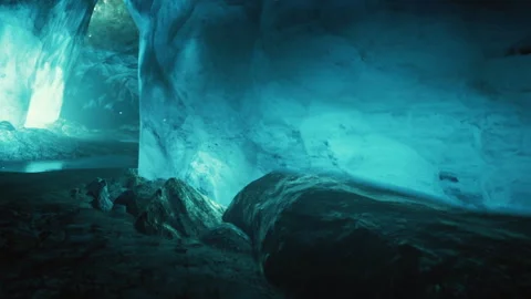 Glowing Ice Cave Reveals Stunning Crystal Formations Under Soft Light Stock Footage 346685934