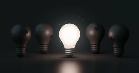 Glowing idea light bulb and innovation thinking creative concept on success.. Stock Photos