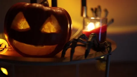 Glowing jack o lantern creates eerie Halloween atmosphere with pumpkin lights Stock-Footage 346147504