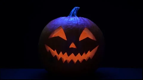 Glowing Jack-o'-Lantern with Light Inside for Halloween Stock Footage 345093454