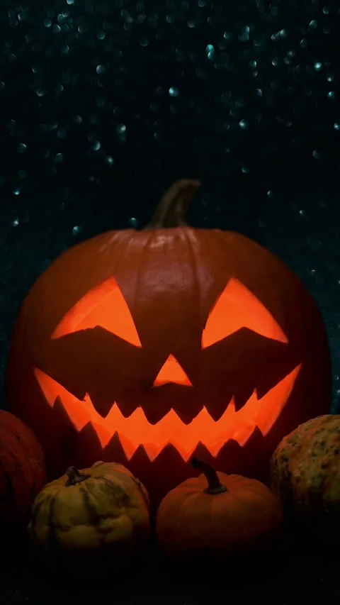 Glowing Jack-o'-Lantern with Light Inside for Halloween Stock Footage 345093596