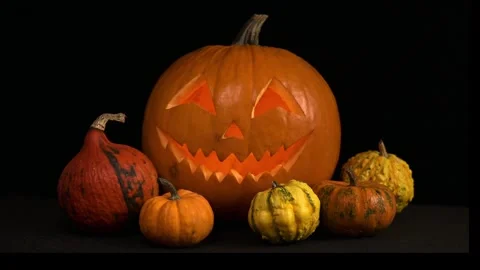 Glowing Jack-o'-Lantern with Light Inside for Halloween Stock Footage 345093638