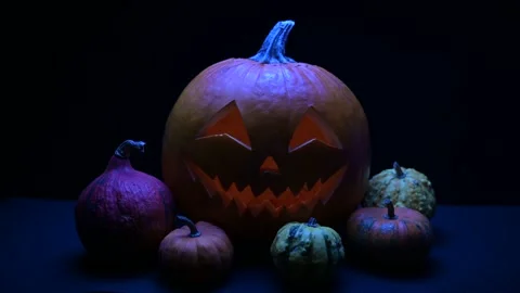 Glowing Jack-o'-Lantern with Light Inside for Halloween Stock Footage 345093789