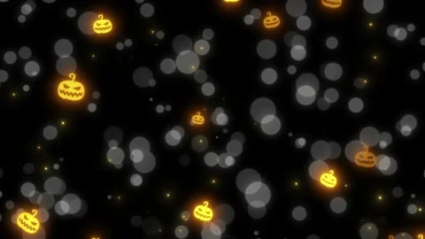 Glowing jack o lanterns floating amidst ethereal white bokeh particles against 스톡 동영상 345329365