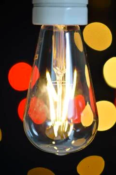 Glowing lamp with bokeh background Stockfoto's