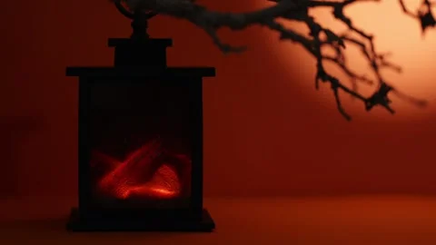 Glowing Lantern Fireplace With Burning Logs on Orange Halloween Background Stock-Footage 342377890