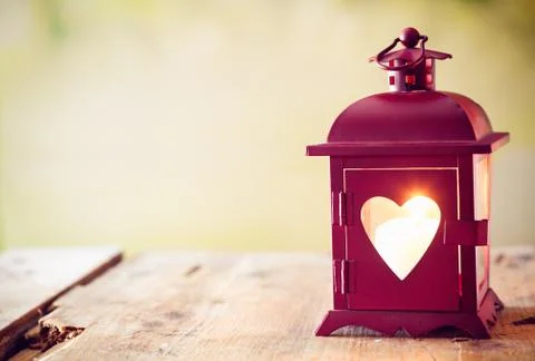 Glowing lantern with a heart Stock Photos