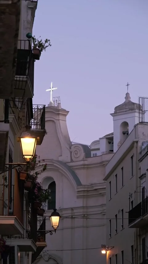 Glowing lanterns on the ancient streets of the city of Bari, Italy. Against the Stock Footage 278965371