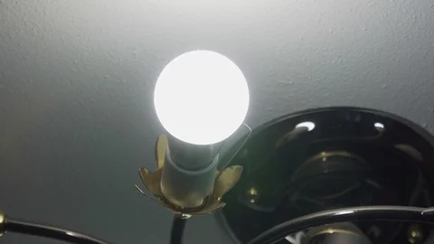 Glowing LED lamp near the ceiling close-up Stock Footage 106728916