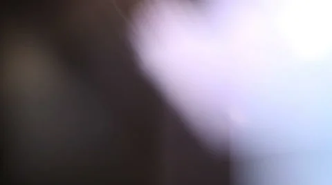 Glowing lens multi colored flares at black background Stock Footage 66199544