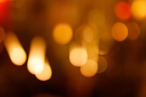 Glowing light bokeh effect with warm tones Stock Photos