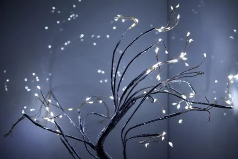 Glowing light branches on dark blue background Stock Photos