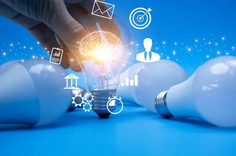 Glowing light bulb concept creativity and new ideas Stock Photos