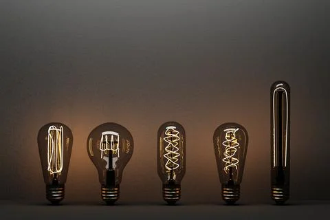 Glowing light bulb isolated on black concrete background - 3D Rendering Stock Photos