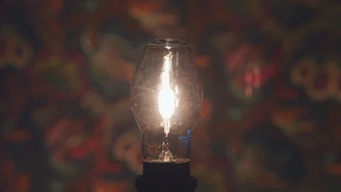 Glowing light bulb in lamp Stock Footage 103783804