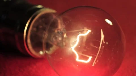 Glowing Light Bulb macro dolly filament Stock Footage 2519013