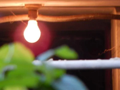 Glowing light bulb Stock Photos