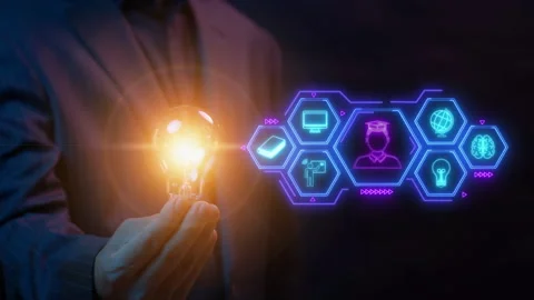 Glowing light bulb showing e-learning icons on virtual screen. Stock Footage 288324338