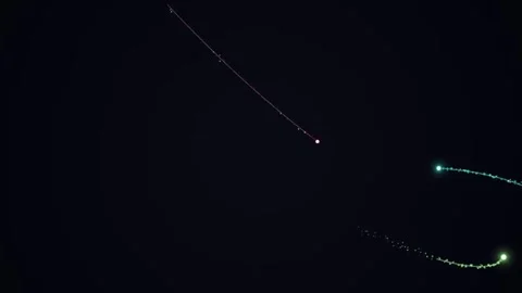 Glowing light trails on a dark background 스톡 동영상 331643669
