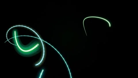Glowing light trails on a dark black background Stock-Footage 331643694