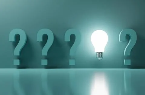Glowing lightbulb among question mark on green background for creative thin.. Stock Photos