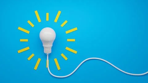 Glowing Lightbulb Symbolizing Creativity and Bright Ideas Stock Photos
