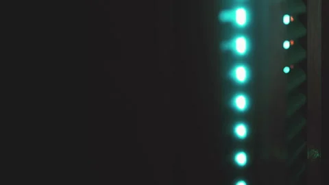 Glowing lights and dark background show electronics in working state Stock Footage 345006184