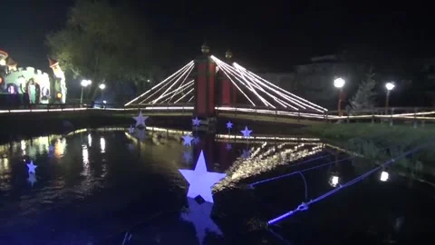 Glowing lights bridge reflected in the river Stock Footage 143825322