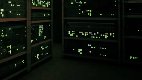 Glowing Lights in a Dark Server Room Create a Tech Filled Atmosphere Stock Footage 347115699